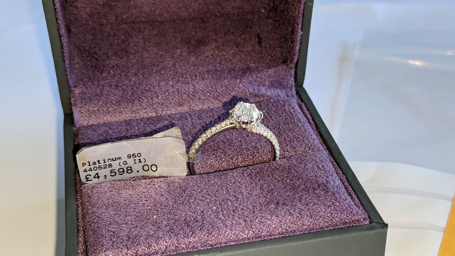 Platinum 950 diamond ring with 0.55ct central stone & 0.348ct of smaller stones on the shoulders. RR - Image 2 of 16