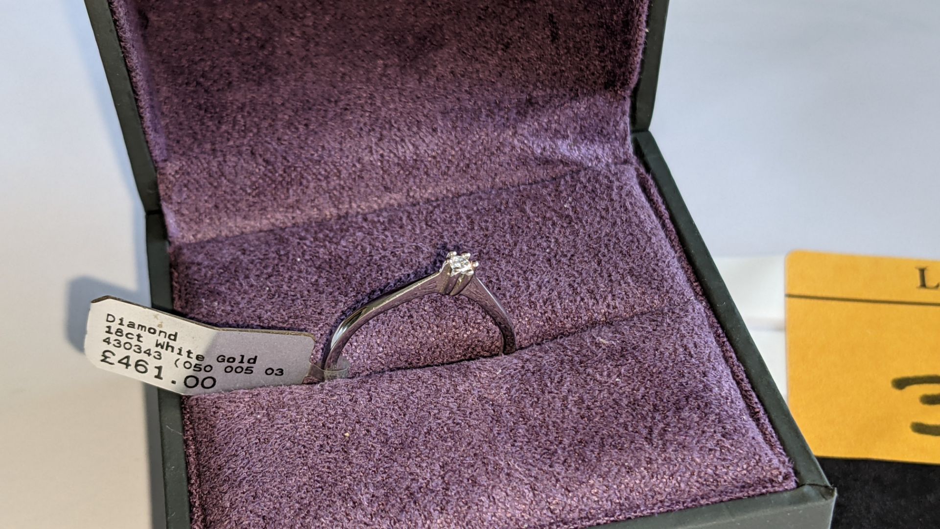 18ct white gold ring with central 0.05ct diamond. RRP £461