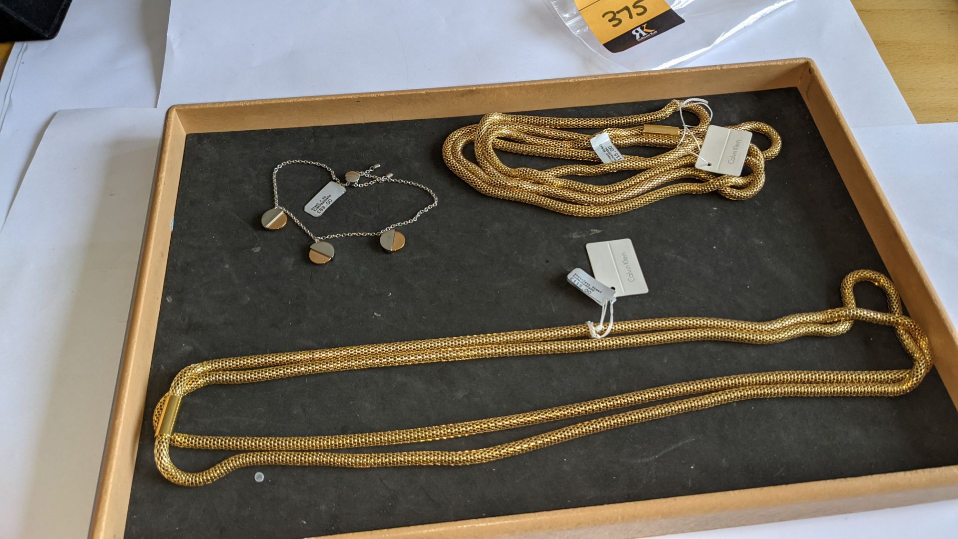 3 pieces of Calvin Klein jewellery comprising 2 off long necklaces each with an RRP of £115 plus two - Image 11 of 13
