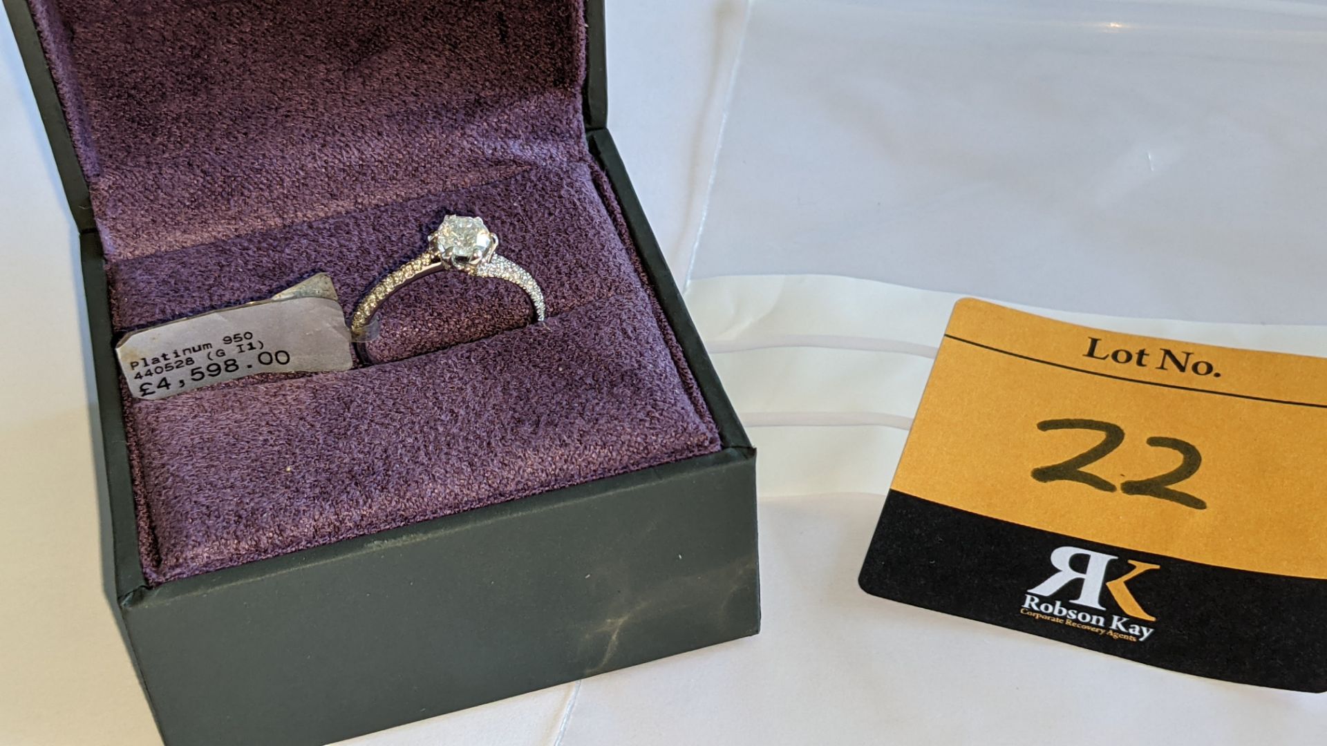 Platinum 950 diamond ring with 0.55ct central stone & 0.348ct of smaller stones on the shoulders. RR