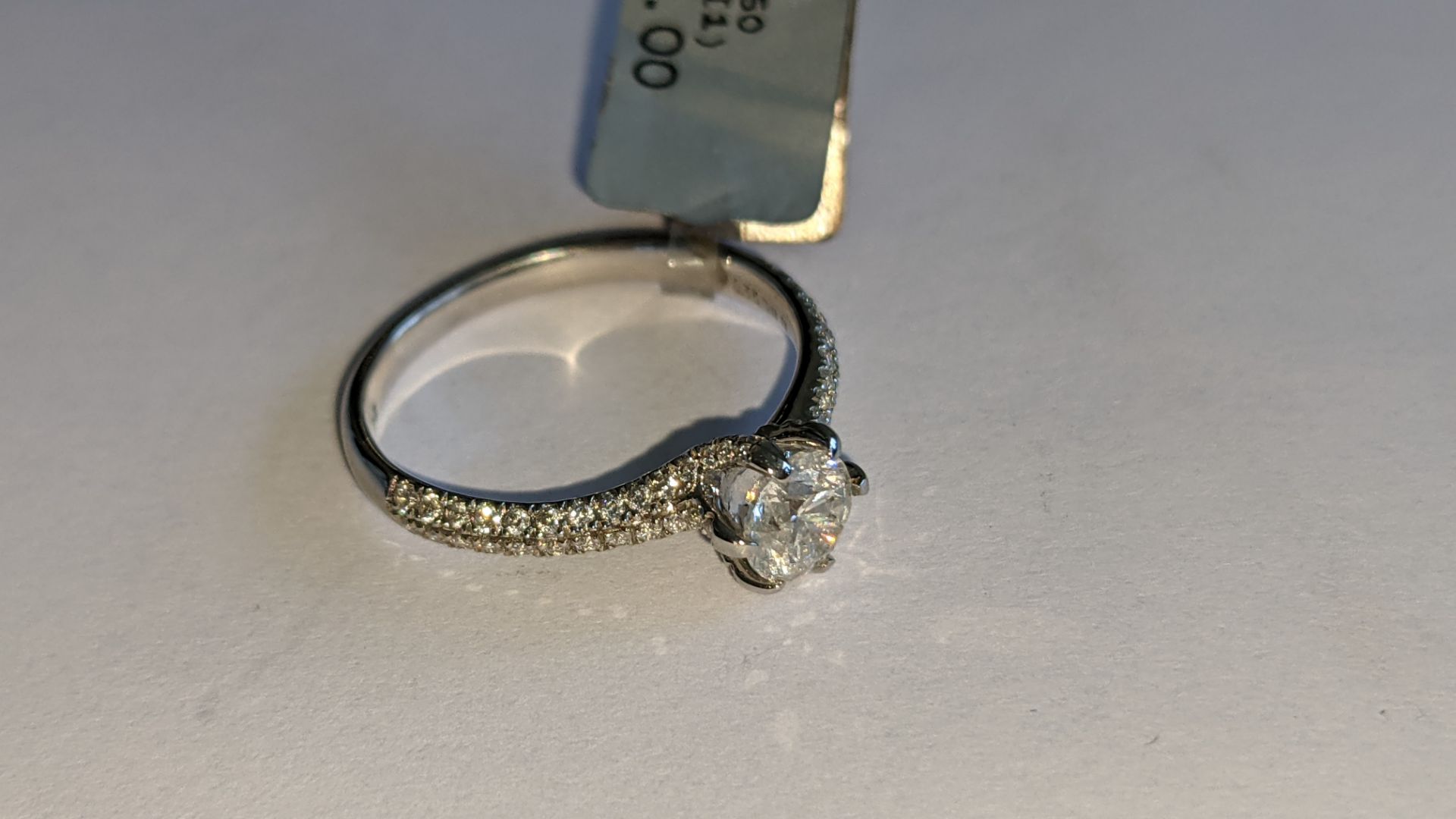 Platinum 950 diamond ring with 0.55ct central stone & 0.348ct of smaller stones on the shoulders. RR - Image 6 of 16