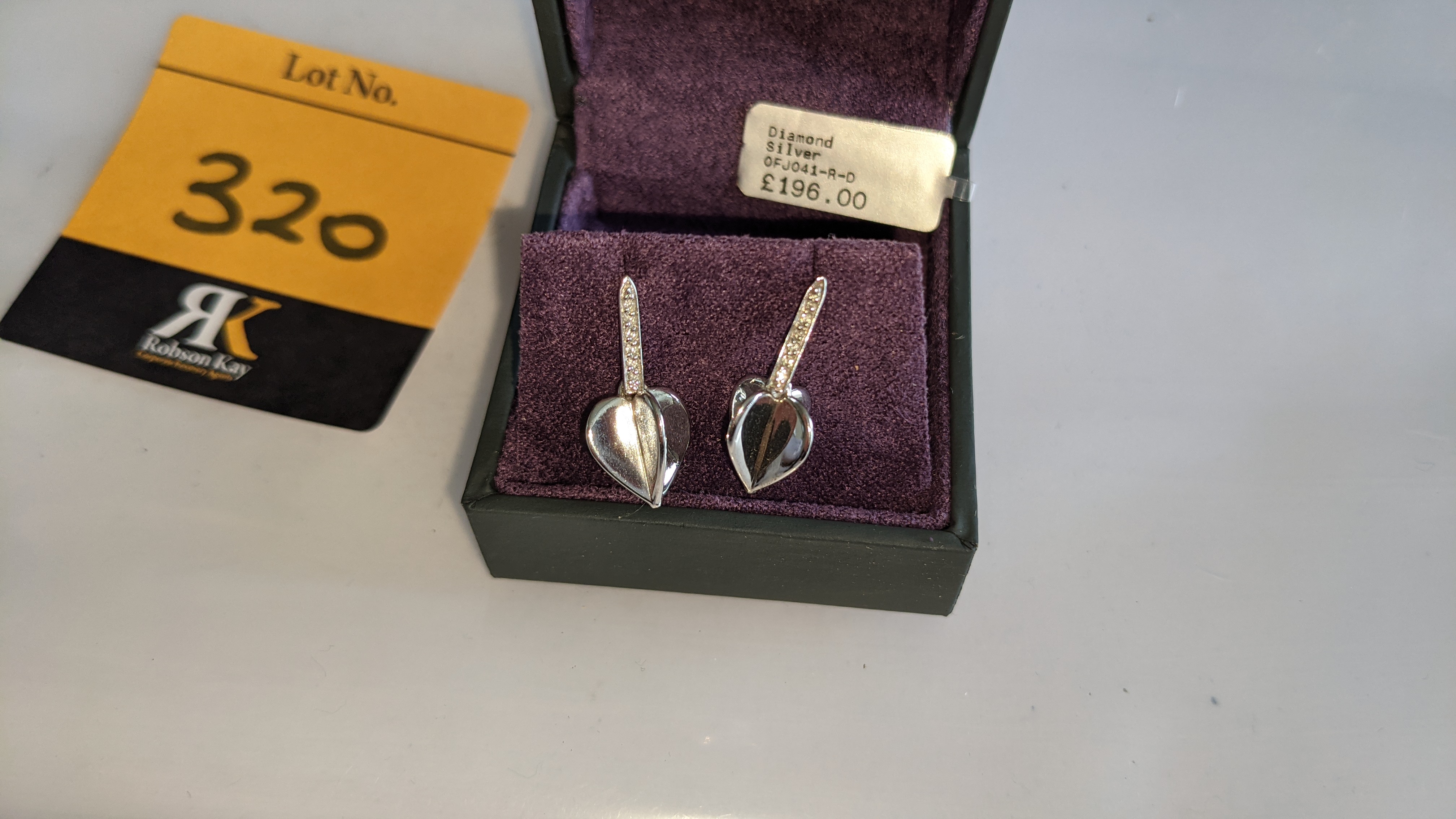Pair of earrings, retail price £196