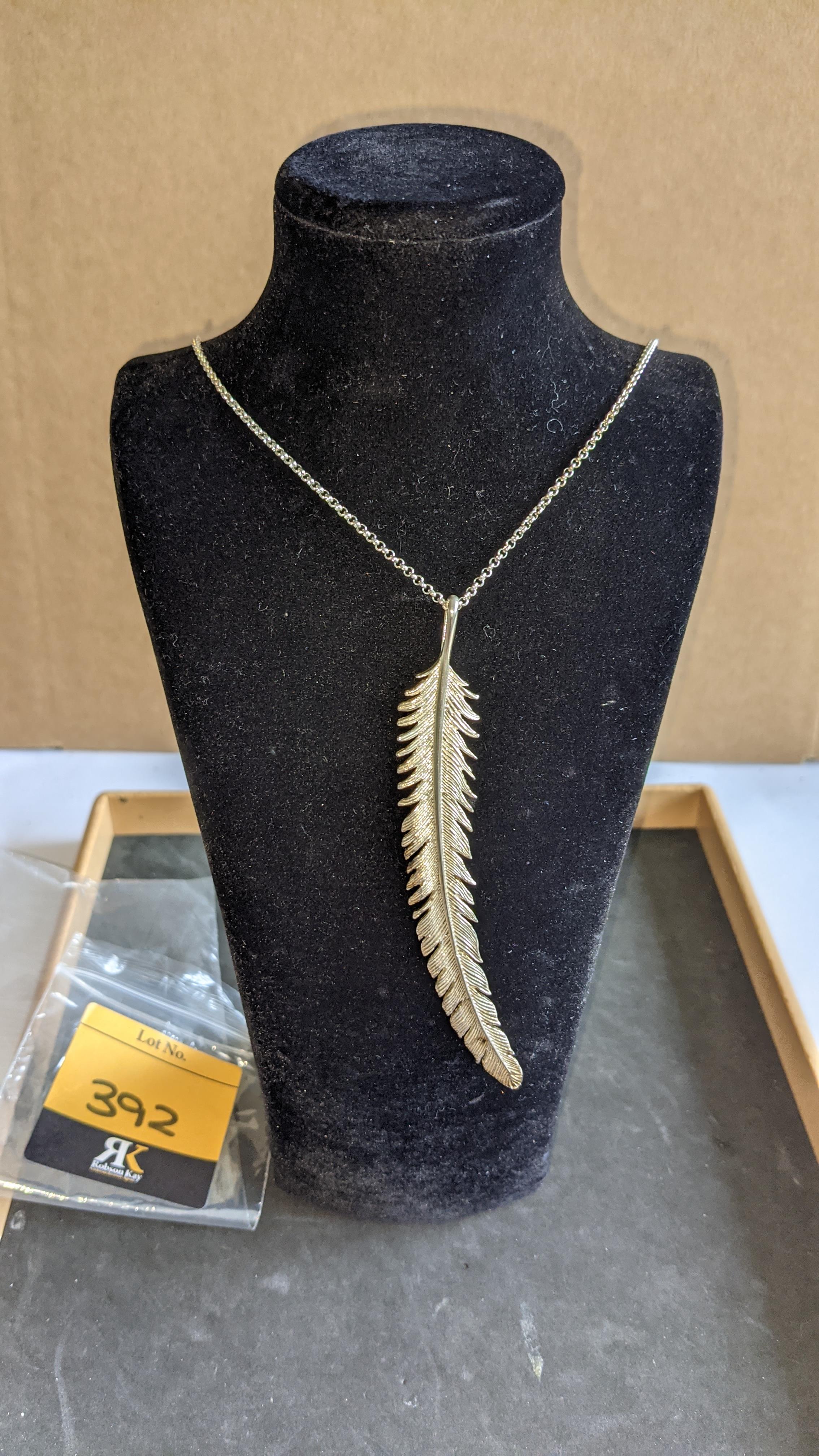 Long curved feather silver pendant on long necklace RRP £295
