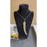 Long curved feather silver pendant on long necklace RRP £295