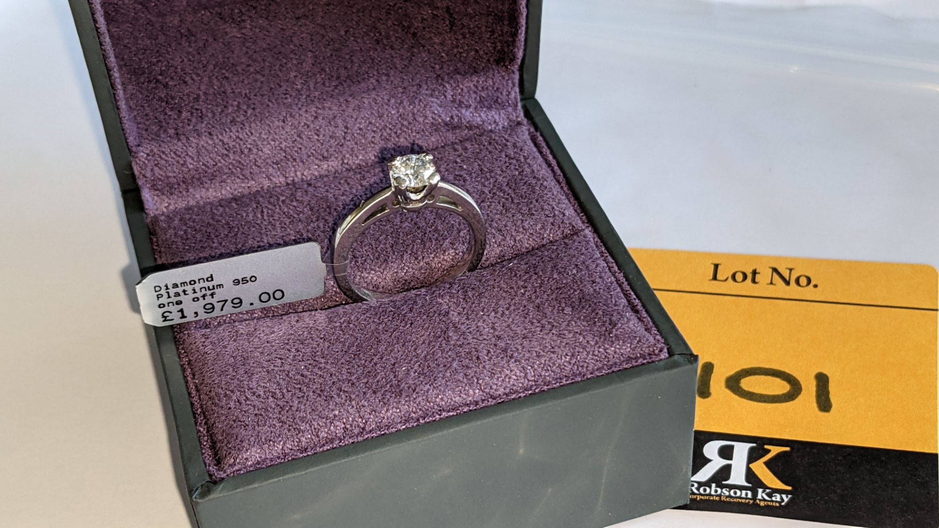 Platinum 950 ring with 0.50ct diamond. Includes diamond report/certification indicating the central
