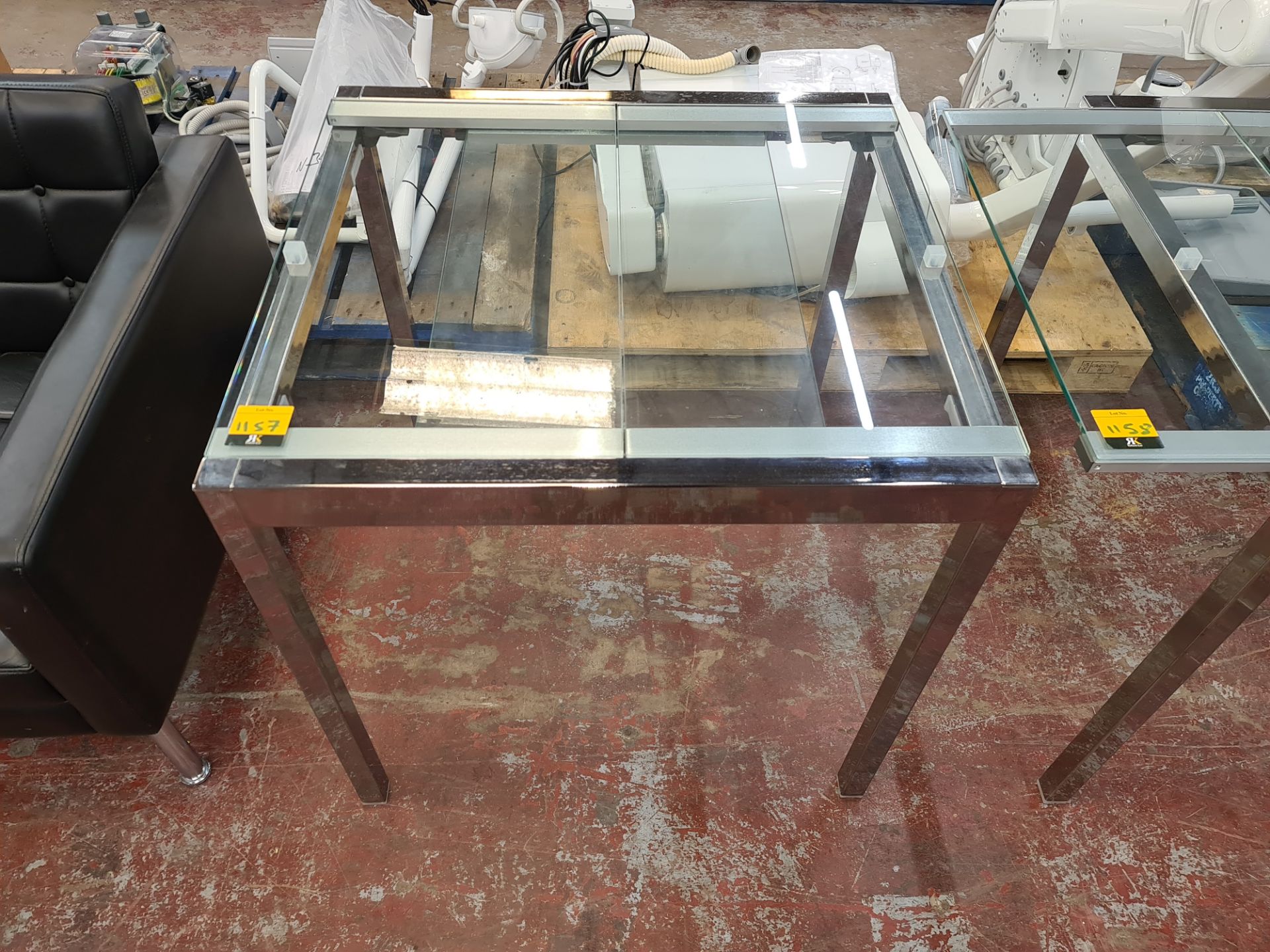 Glass & chrome extending table, with slide-in/out glass extension piece.