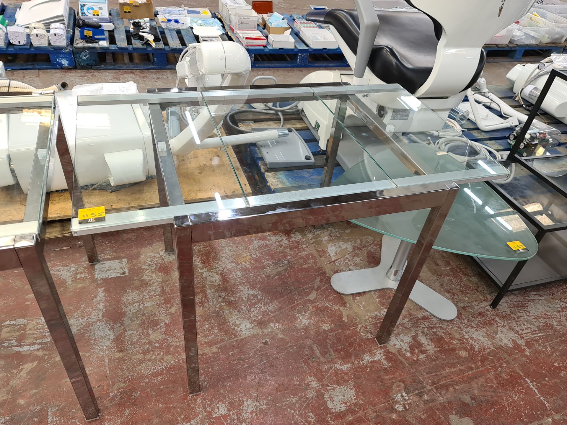 Glass & chrome extending table, with slide-in/out glass extension piece.