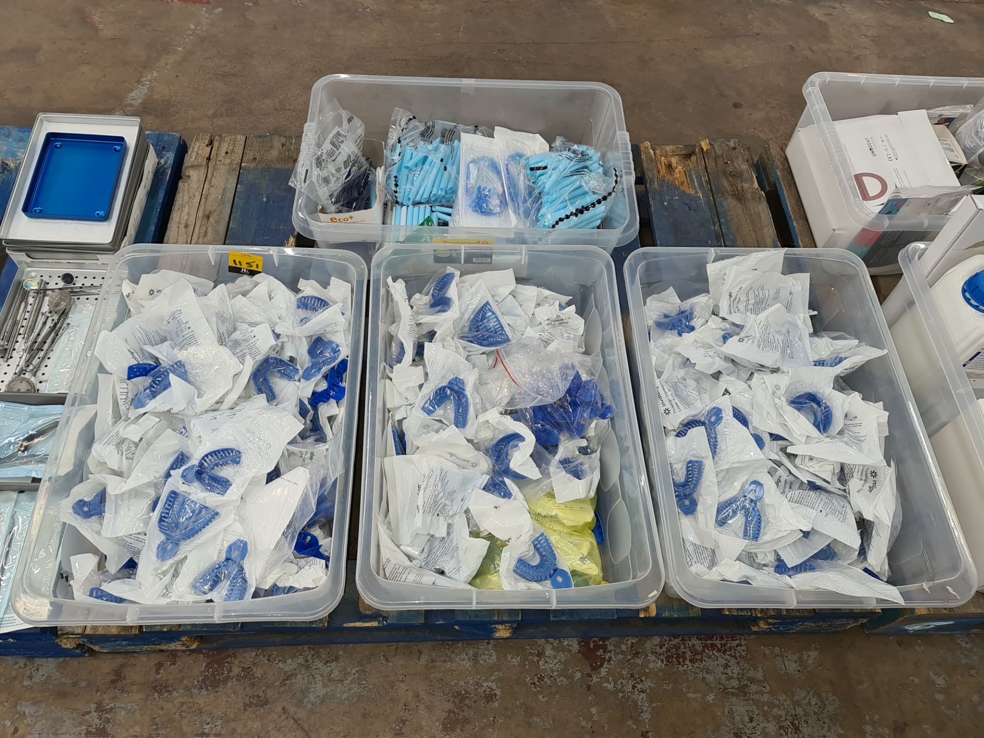 The contents of 4 large crates of Invisalign impression trays, Cybertech aspirator tubes & more