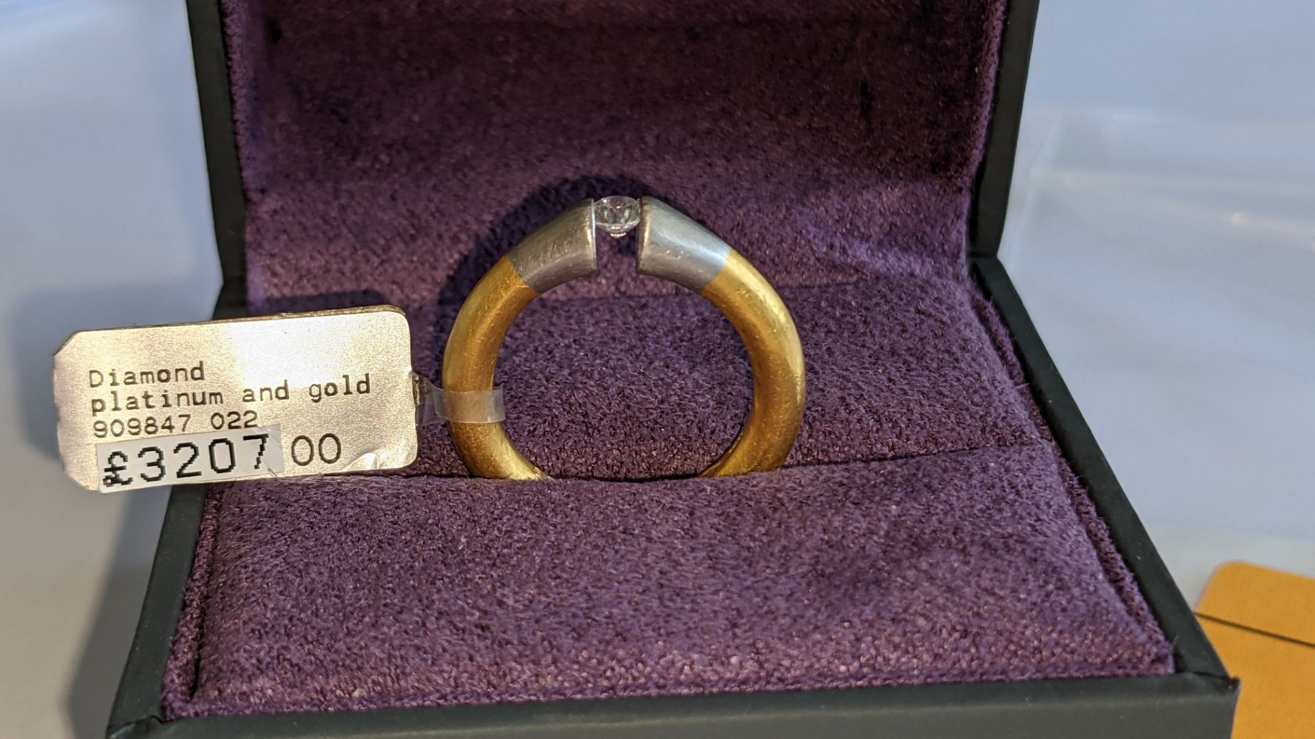 Platinum & yellow gold ring with 0.22ct central brilliant cut diamond. RRP £3,207 - Image 4 of 14