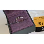 Platinum 950 ring with diamonds weighing total of 0.235ct. Ring 3.5mm wide. Diamonds surround the en