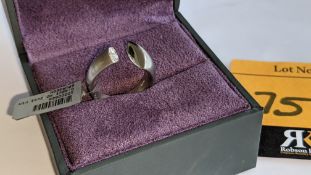Modern ring in platinum 950 with 0.42ct stone at one end of unusual modern design. RRP £5,786