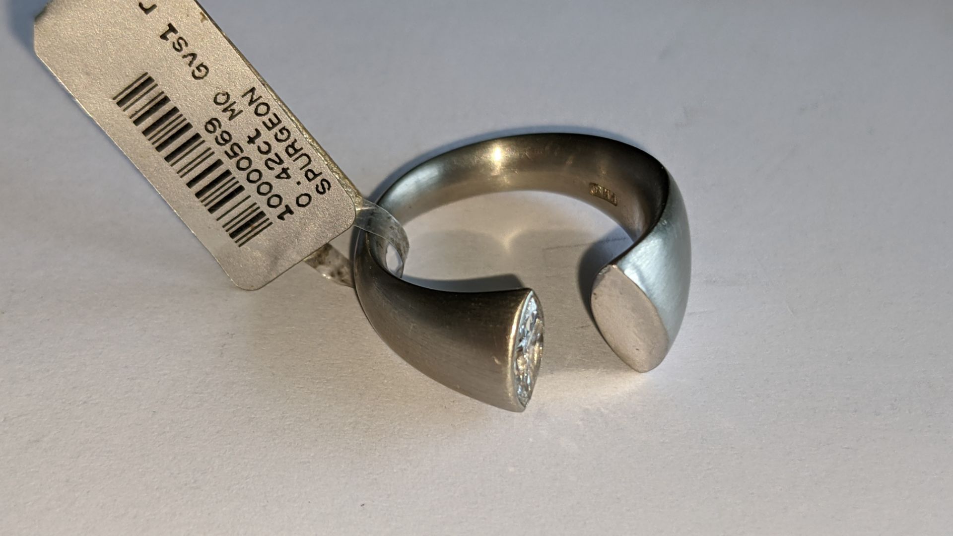 Modern ring in platinum 950 with 0.42ct stone at one end of unusual modern design. RRP £5,786 - Image 8 of 19