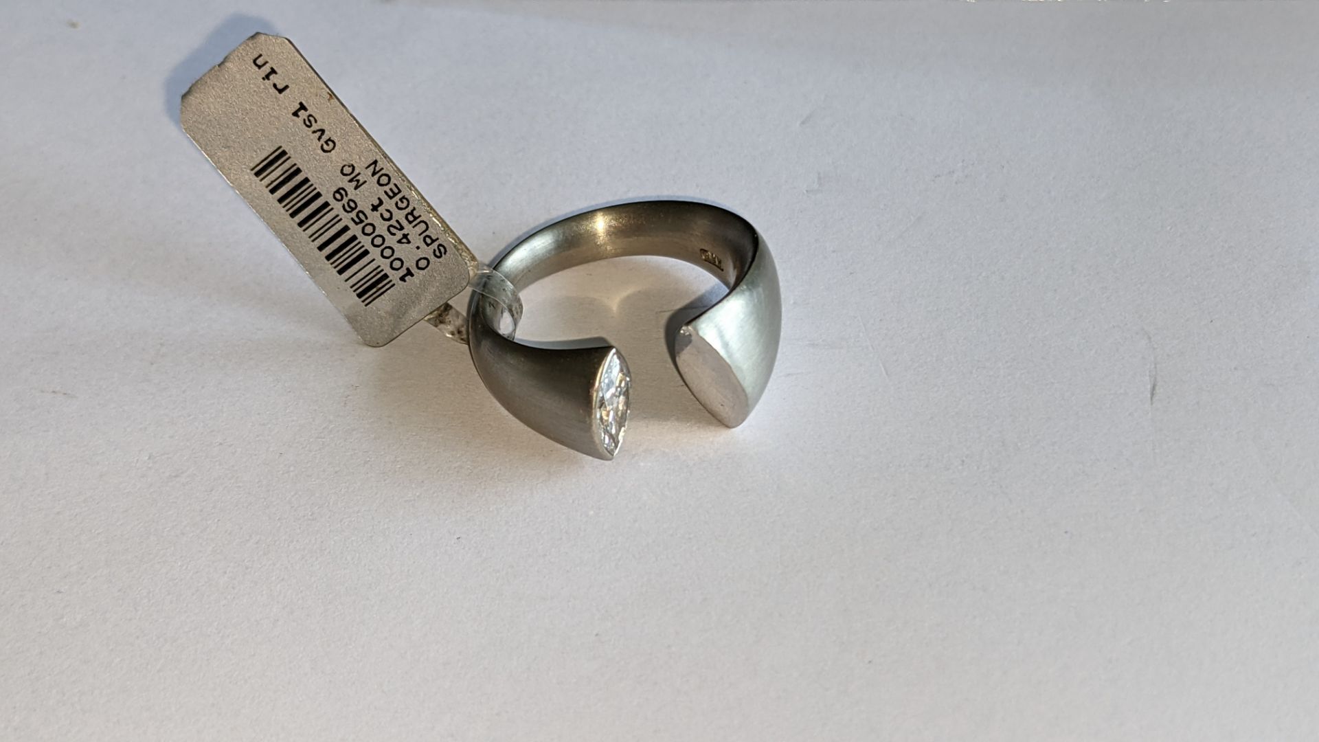 Modern ring in platinum 950 with 0.42ct stone at one end of unusual modern design. RRP £5,786 - Image 9 of 19