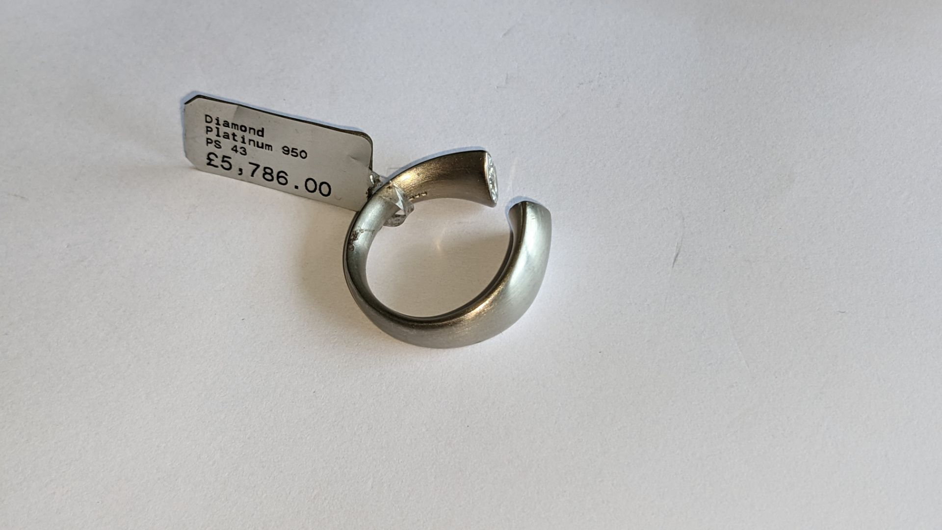 Modern ring in platinum 950 with 0.42ct stone at one end of unusual modern design. RRP £5,786 - Image 11 of 19