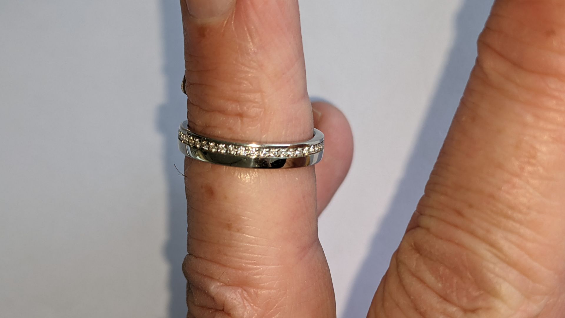 Platinum 950 ring with diamonds weighing total of 0.235ct. Ring 3.5mm wide. Diamonds surround the en - Image 14 of 15