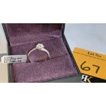 18ct white gold ring with central diamond weighing 0.40ct & diamonds on both shoulders weighing a to