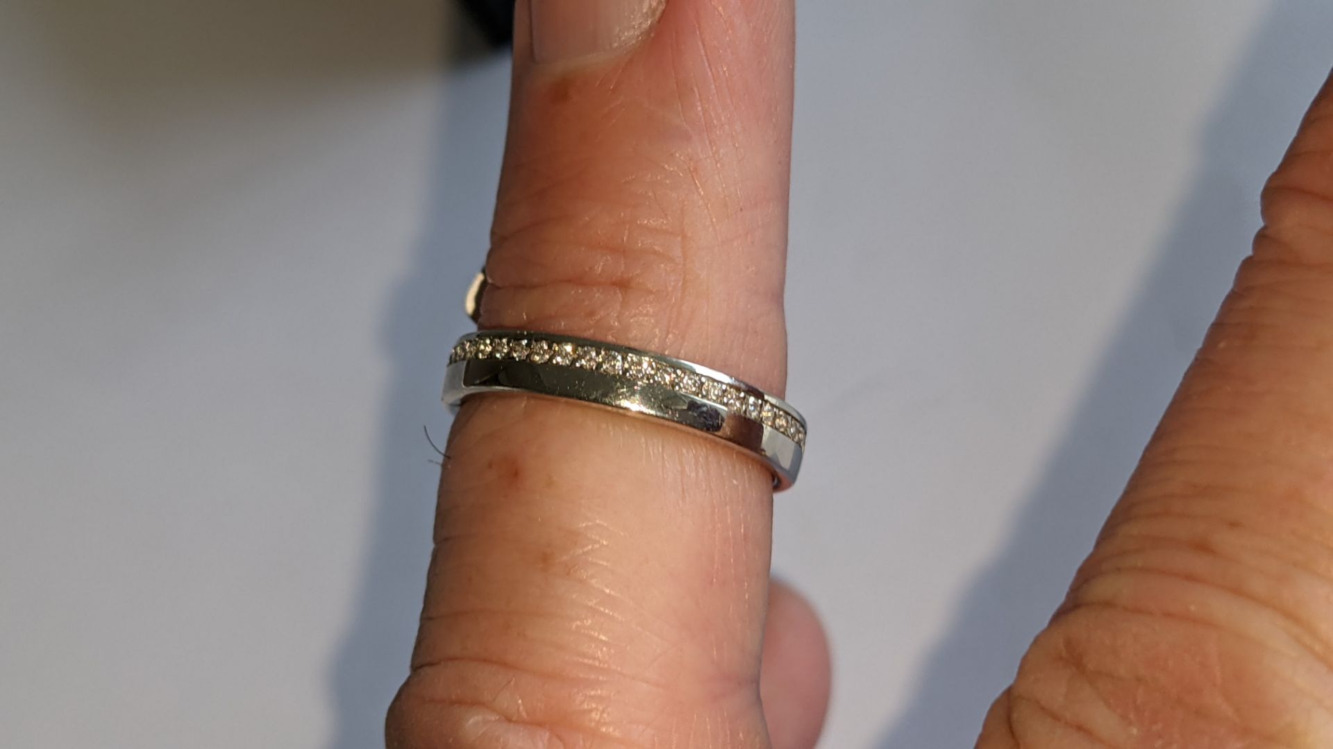 Platinum 950 ring with diamonds weighing total of 0.235ct. Ring 3.5mm wide. Diamonds surround the en - Image 13 of 15