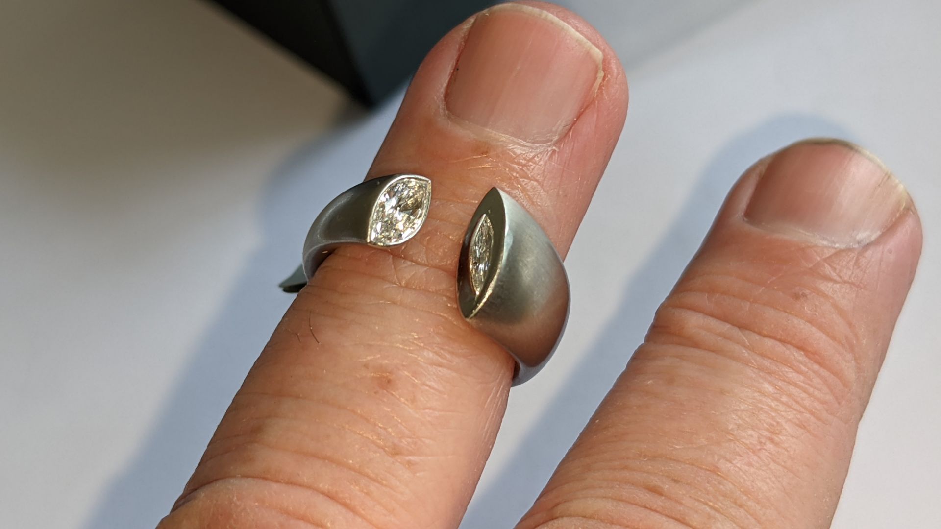 Modern ring in platinum 950 with 0.42ct stone at one end of unusual modern design. RRP £5,786 - Image 16 of 19