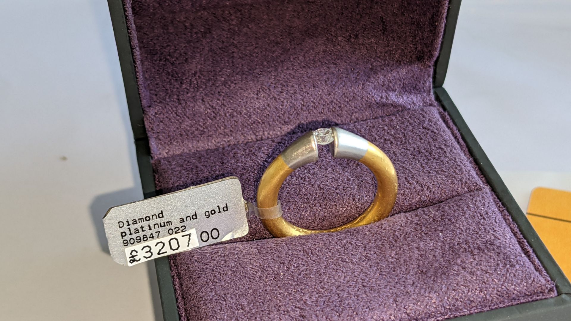 Platinum & yellow gold ring with 0.22ct central brilliant cut diamond. RRP £3,207 - Image 2 of 14