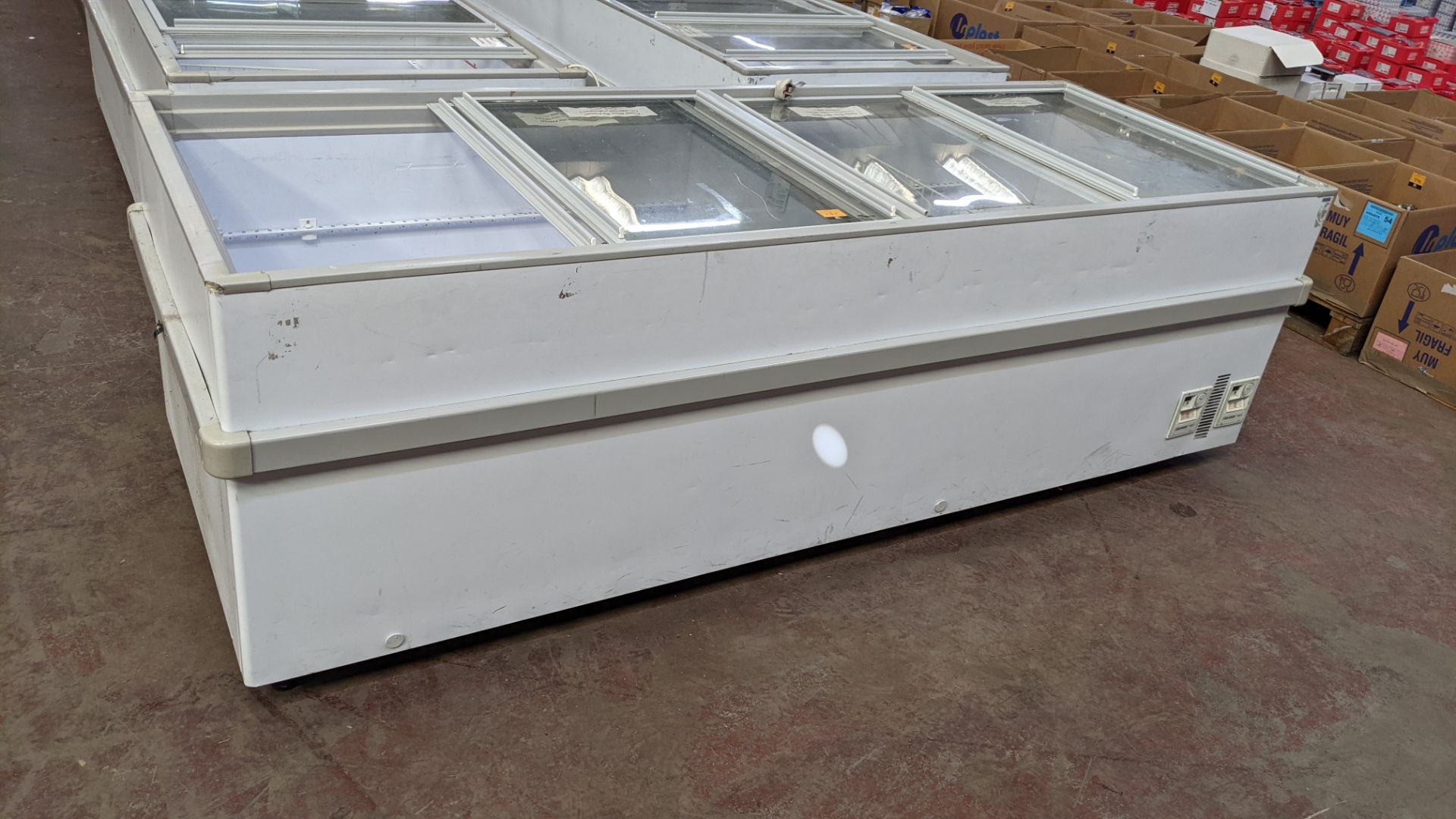 Very large chest freezer with 4 section clear top. Overall dimensions circa 2455mm x 910mm