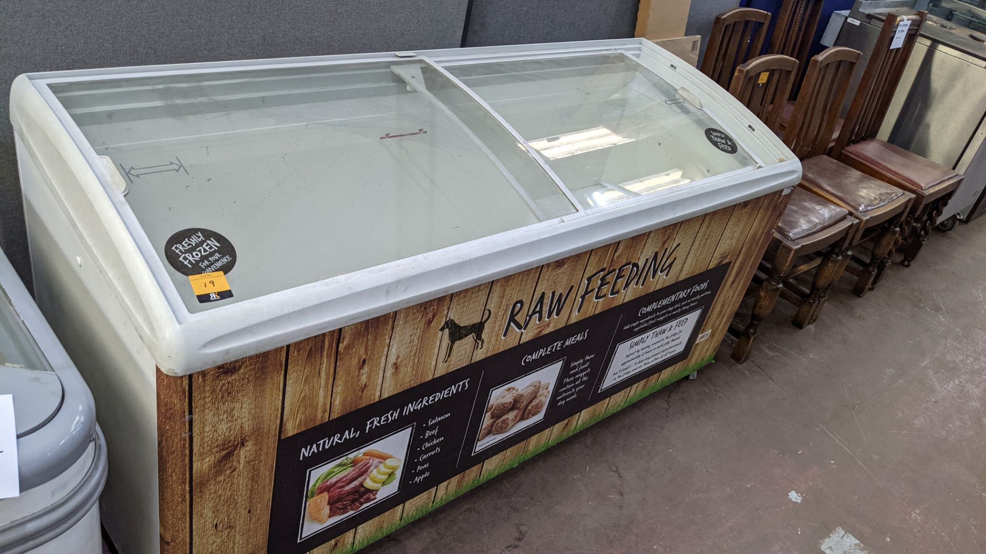 Clear topped chest freezer on wheels measuring approx. 1550mm x 660mm