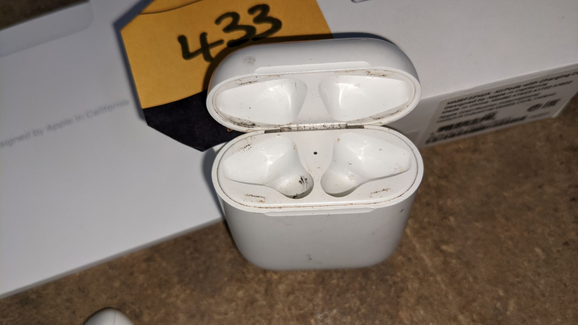 Apple AirPods with charging case, box & book pack - Image 12 of 15