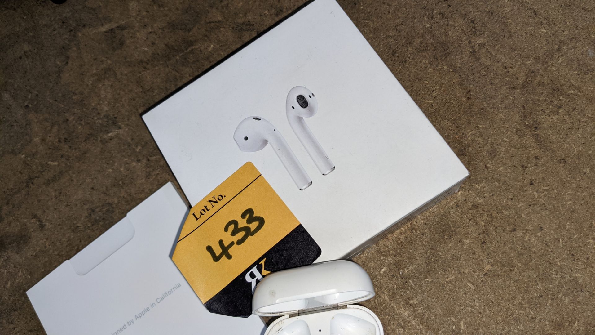 Apple AirPods with charging case, box & book pack - Image 9 of 15