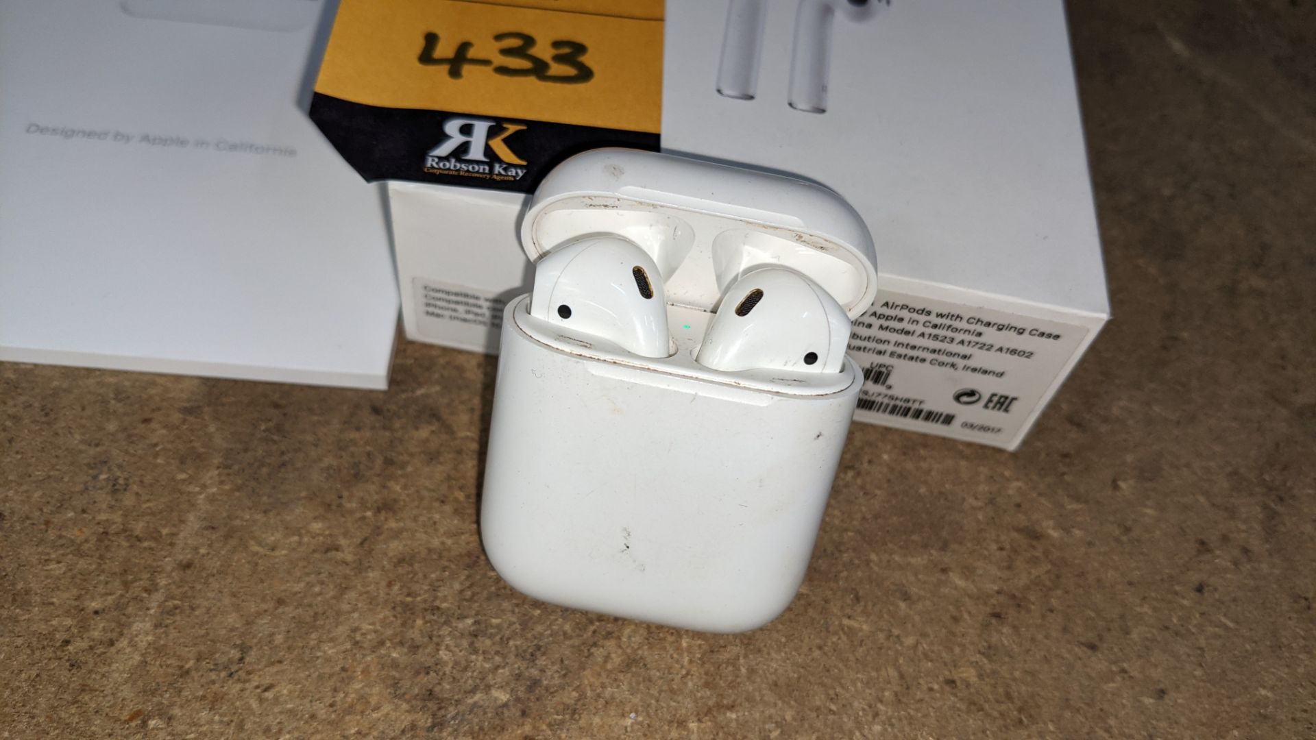 Apple AirPods with charging case, box & book pack - Image 15 of 15