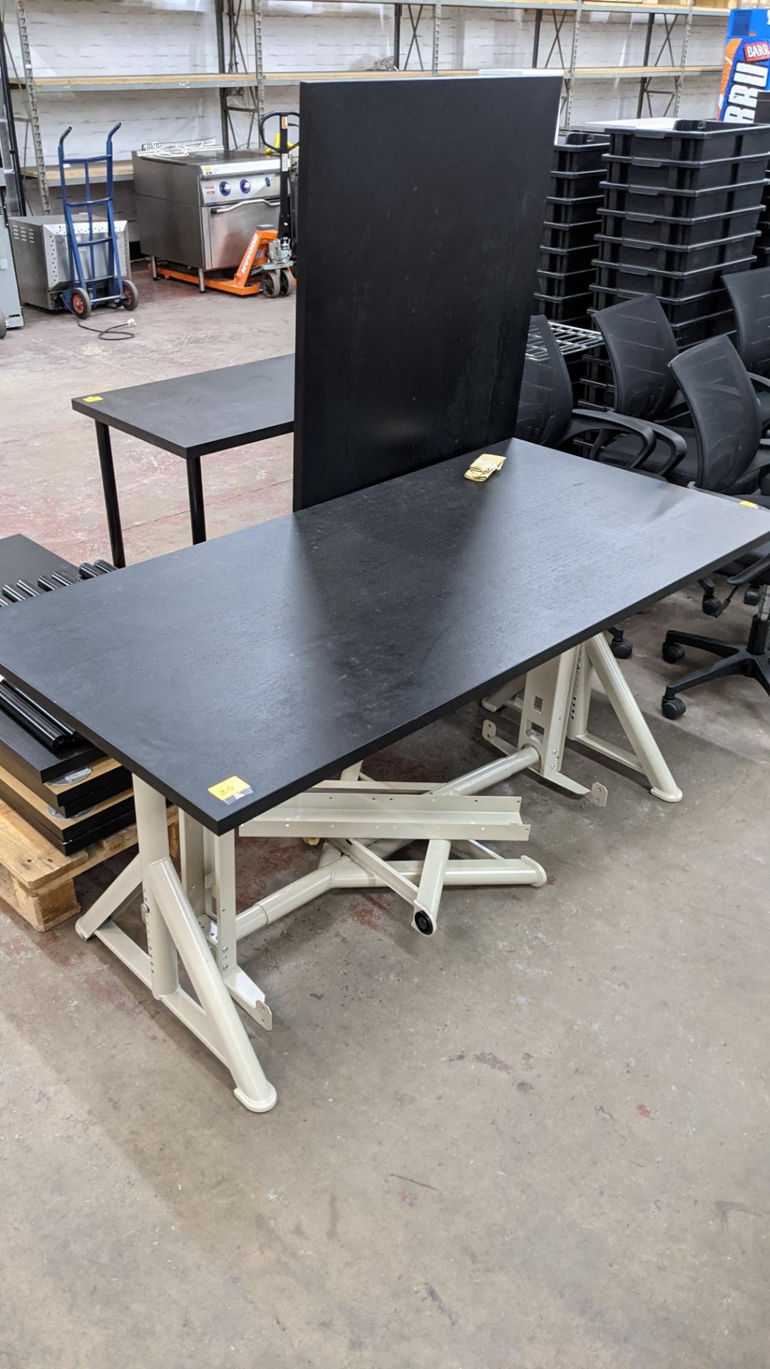 Pair of height adjustable tables each comprising black laminated top measuring 1600mm x 800mm on hea - Image 2 of 6