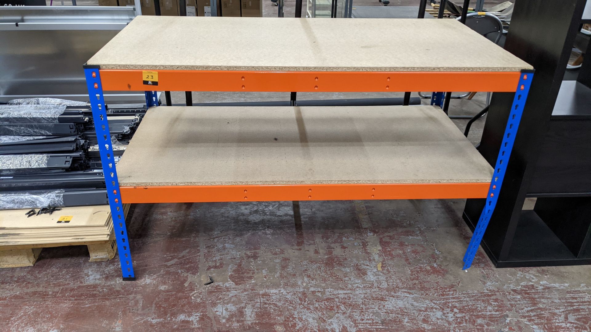 Workbench comprised of orange & blue bolt-free racking with 2 chipboard shelves - Image 2 of 4