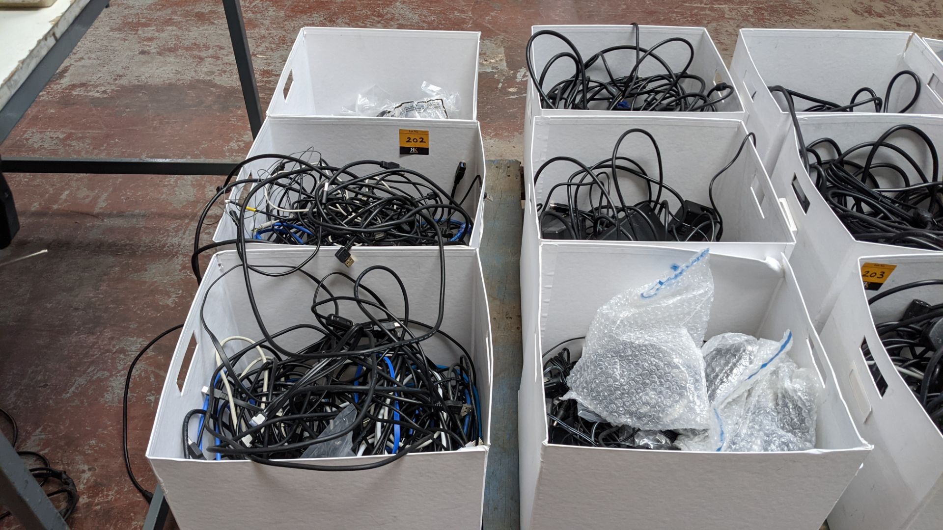 6 boxes of computer & other cables & powerpacks