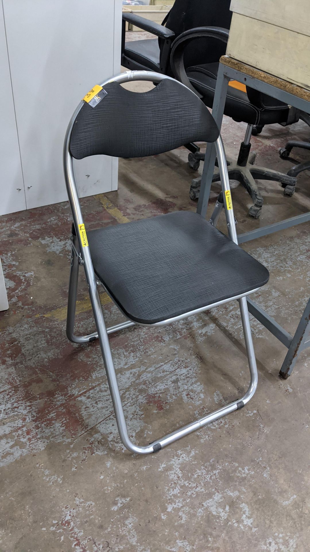 Lightweight upholstered folding chair - Image 2 of 4