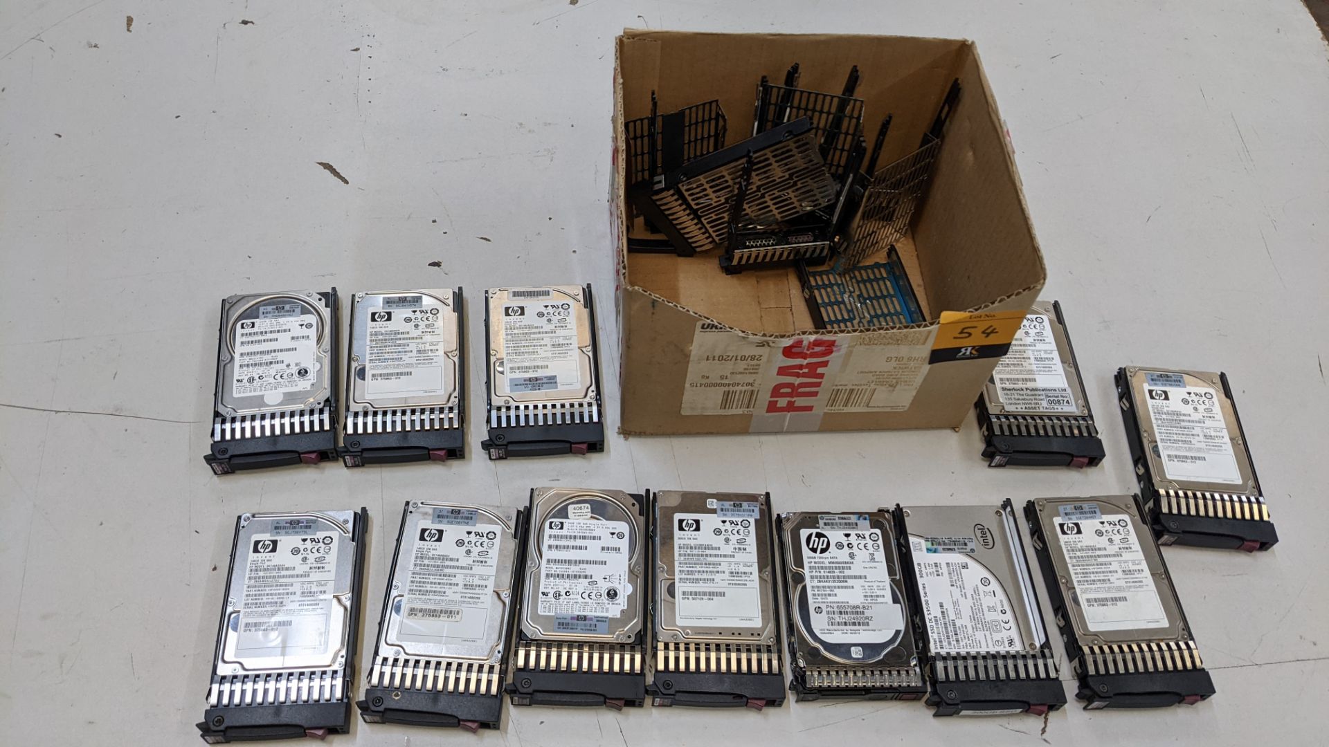 12 off assorted server hard drives comprising 1 off 300GB SSD drive, 1 off 500GB hard drive, 1 off 3