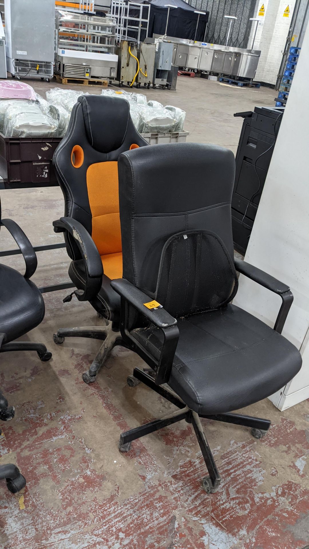 Pair of high back leather/leather-look chairs, one with orange inserts & one with a mesh back suppor