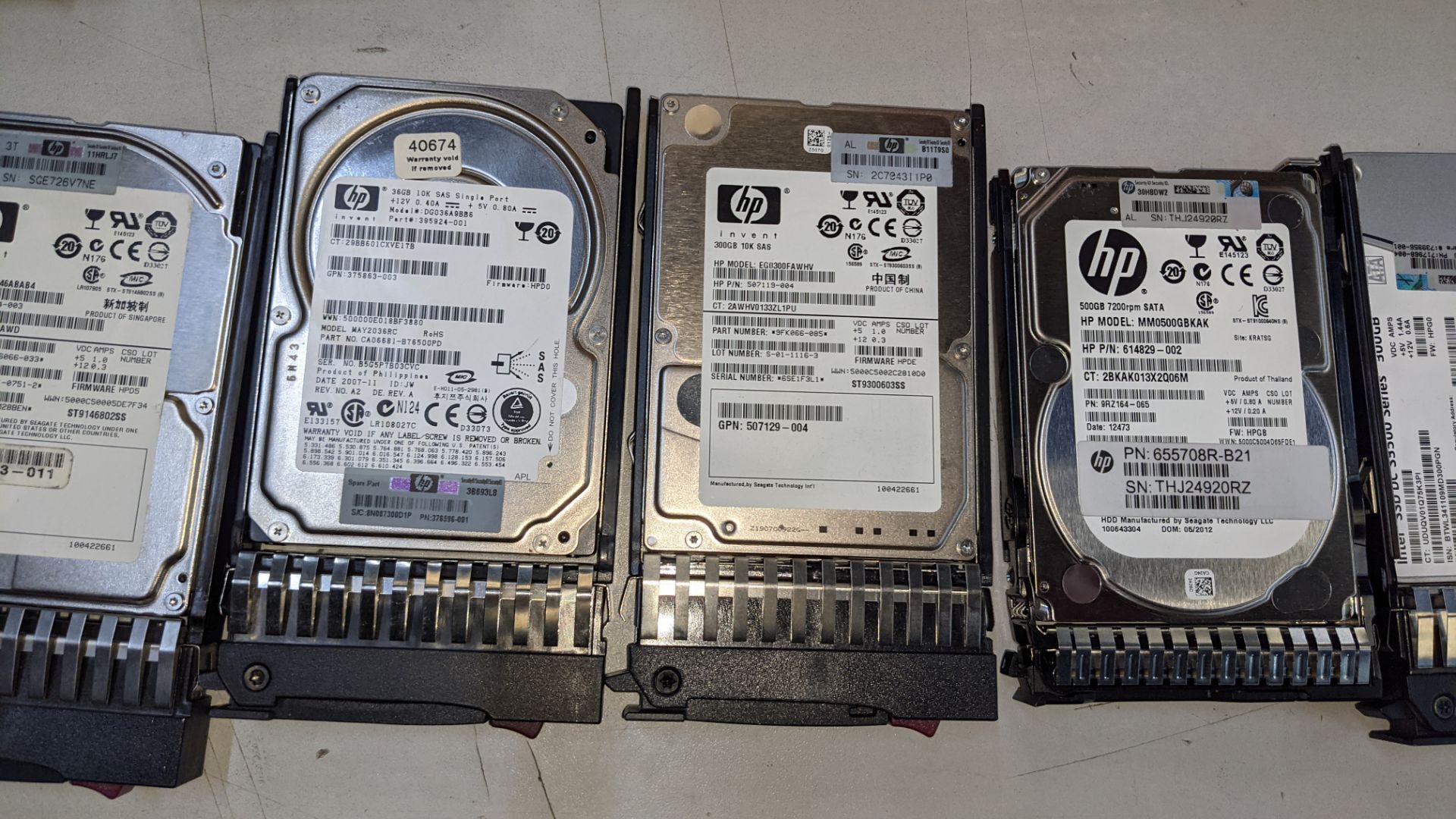 12 off assorted server hard drives comprising 1 off 300GB SSD drive, 1 off 500GB hard drive, 1 off 3 - Image 5 of 9