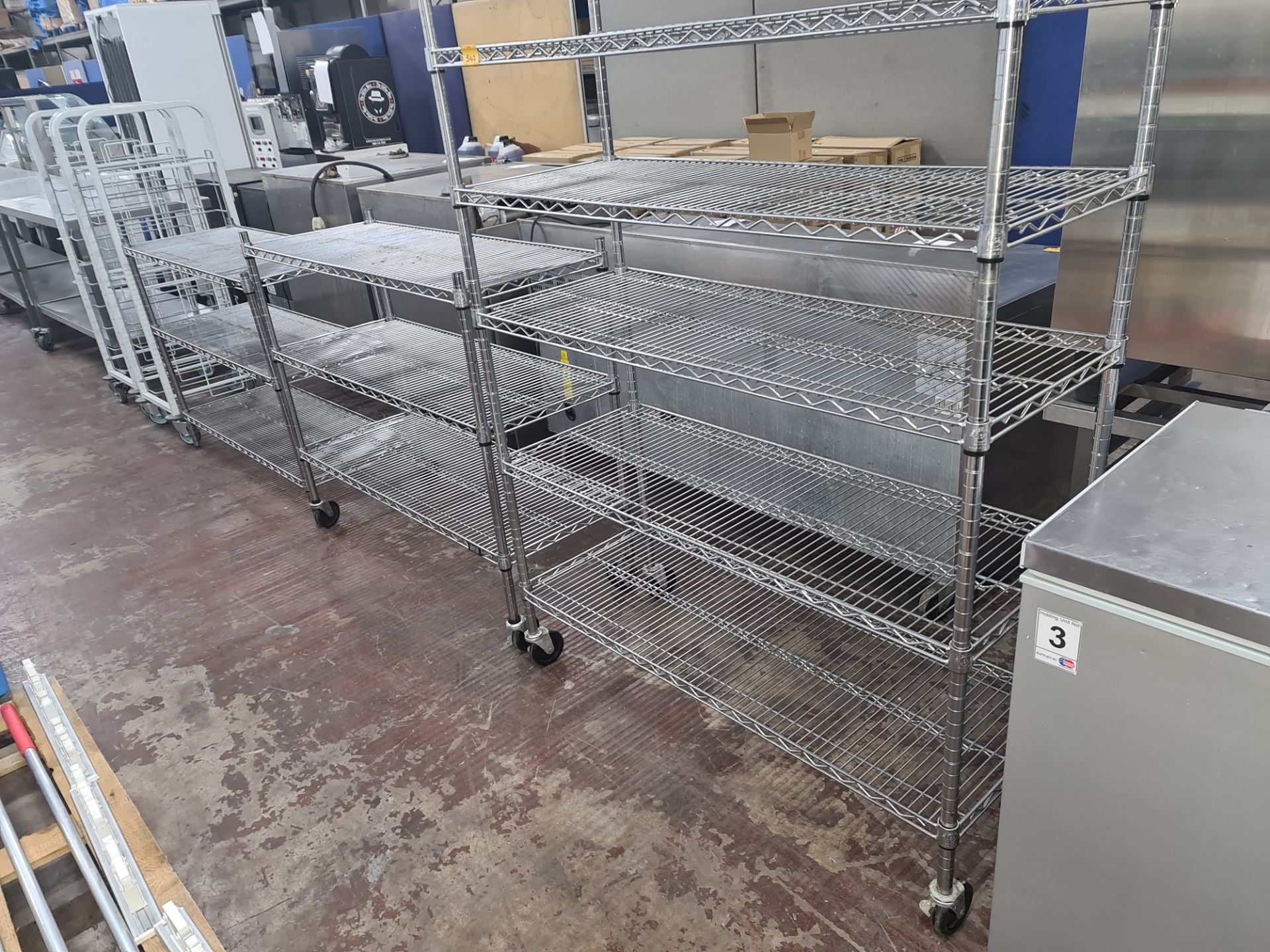 Quantity of chrome bolt-free racking, comprising 12 shelves, all measuring approx. 1.2m wide plus on