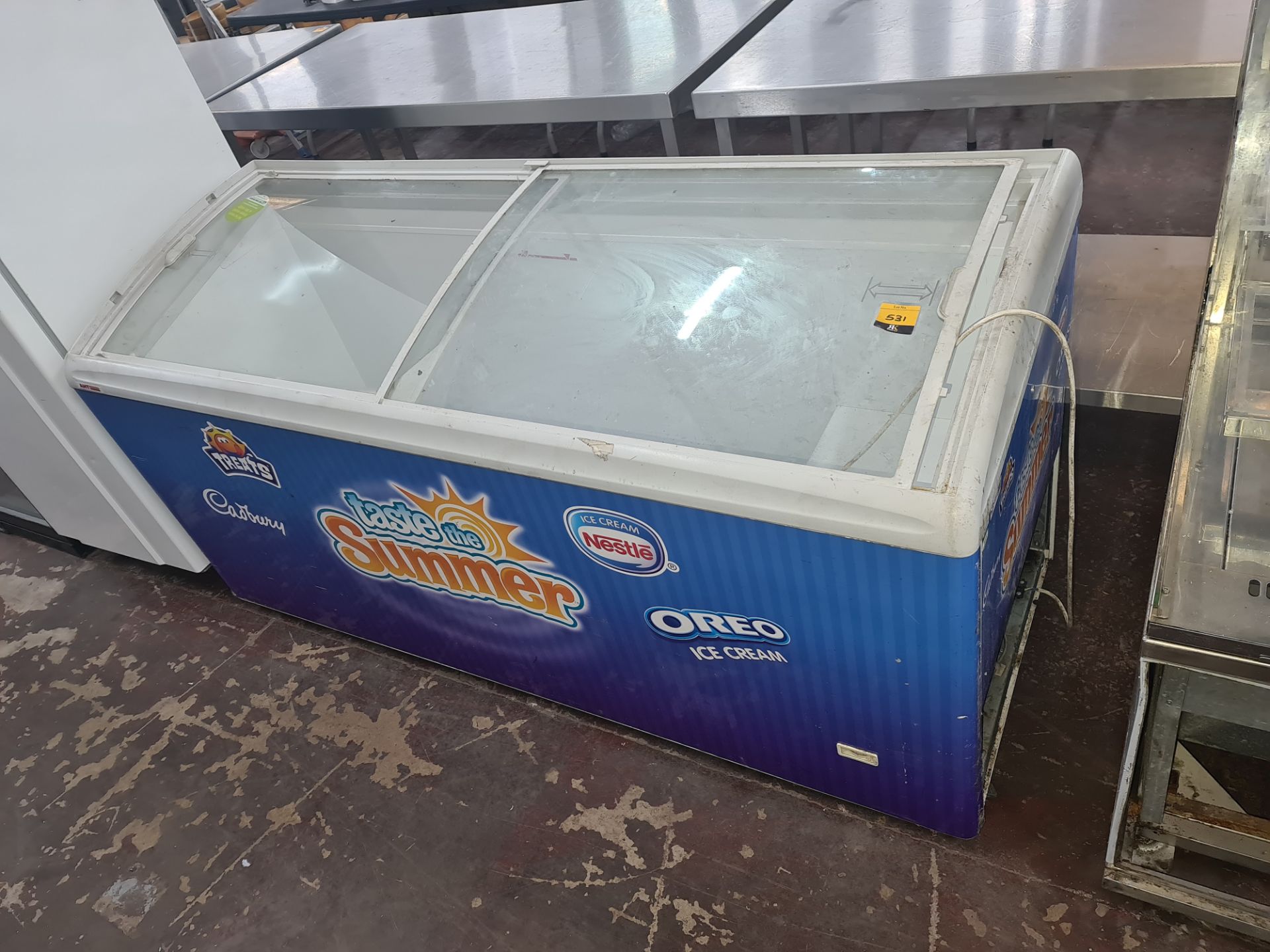Clear topped chest freezer measuring approx. 1750mm x 650mm x 870mm