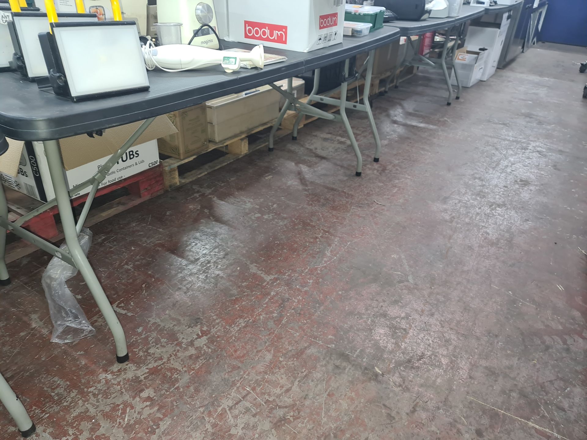 4 off heavy-duty folding trestle tables with plastic tops & metal legs, incorporating a carry handle - Image 5 of 5