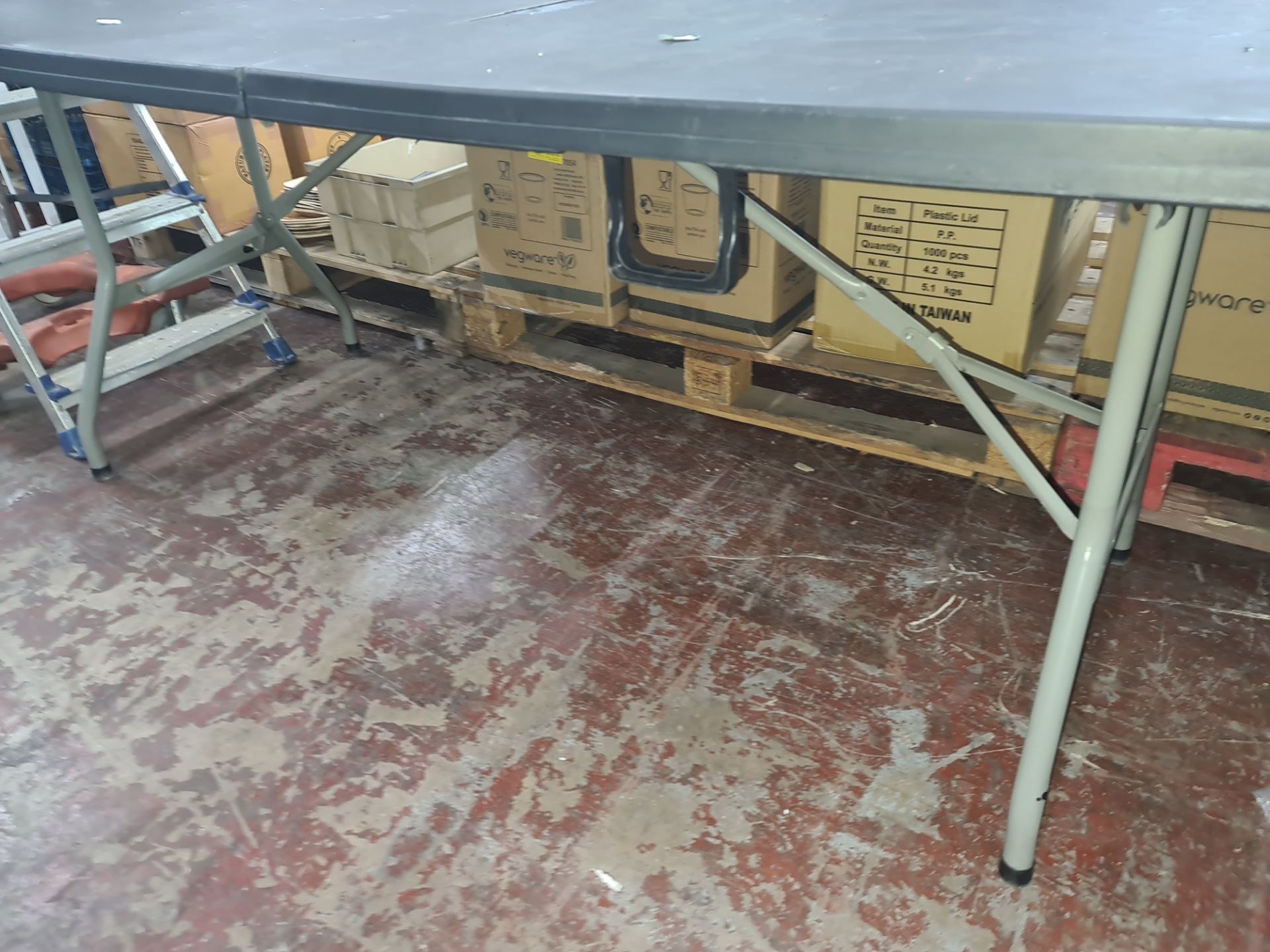 4 off heavy-duty folding trestle tables with plastic tops & metal legs, incorporating a carry handle - Image 2 of 5