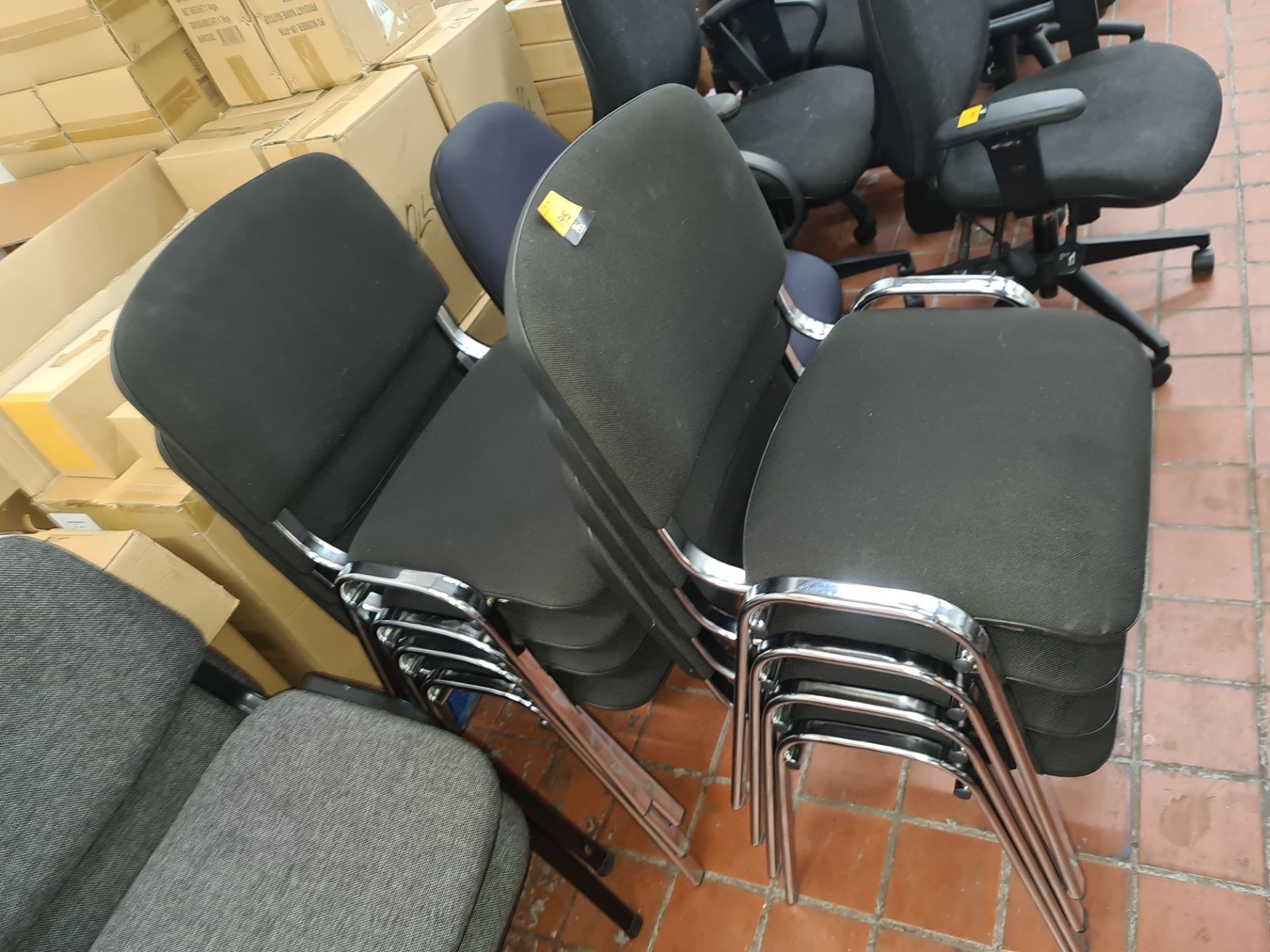 8 off matching stacking stand chairs in black fabric on chrome frames