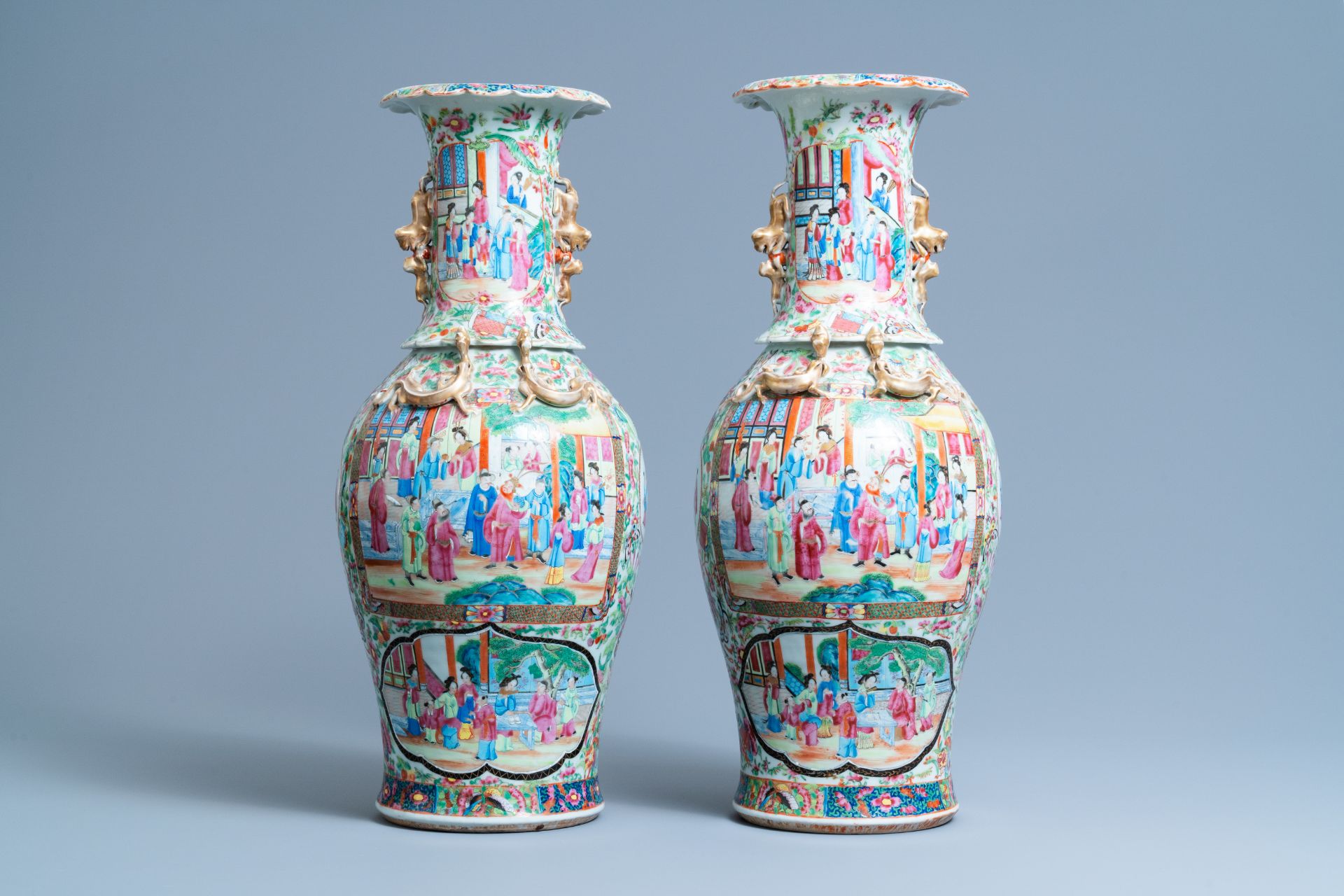 A pair of Chinese Canton famille rose vases, 19th C.