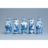 A Chinese blue and white garniture of five vases, Kangxi mark, 19th C.