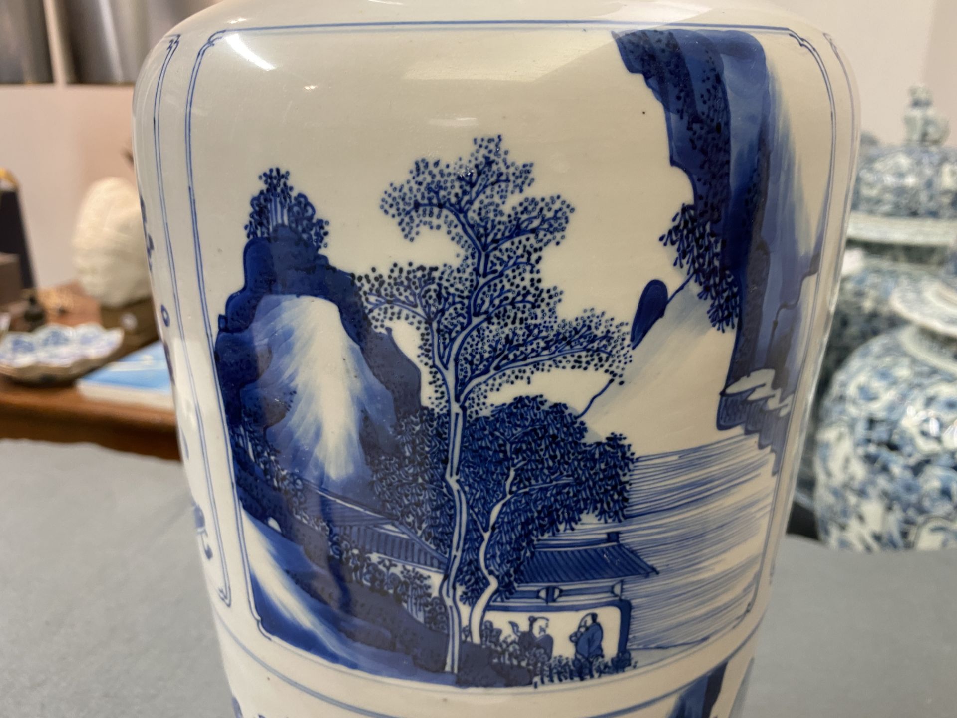A Chinese blue and white 'antiquities and landscapes' rouleau vase, Kangxi - Image 30 of 35