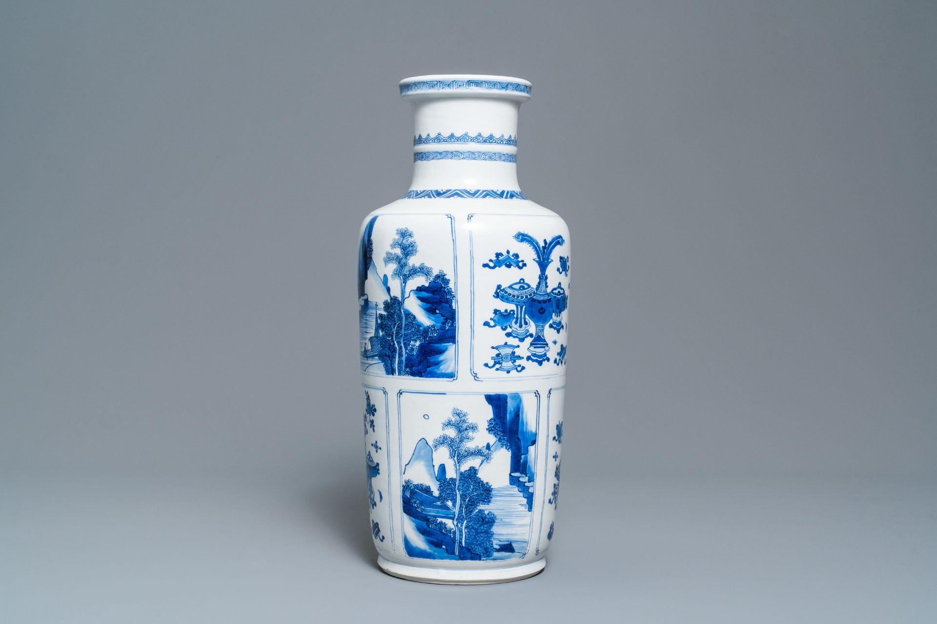 A Chinese blue and white 'antiquities and landscapes' rouleau vase, Kangxi - Image 4 of 35