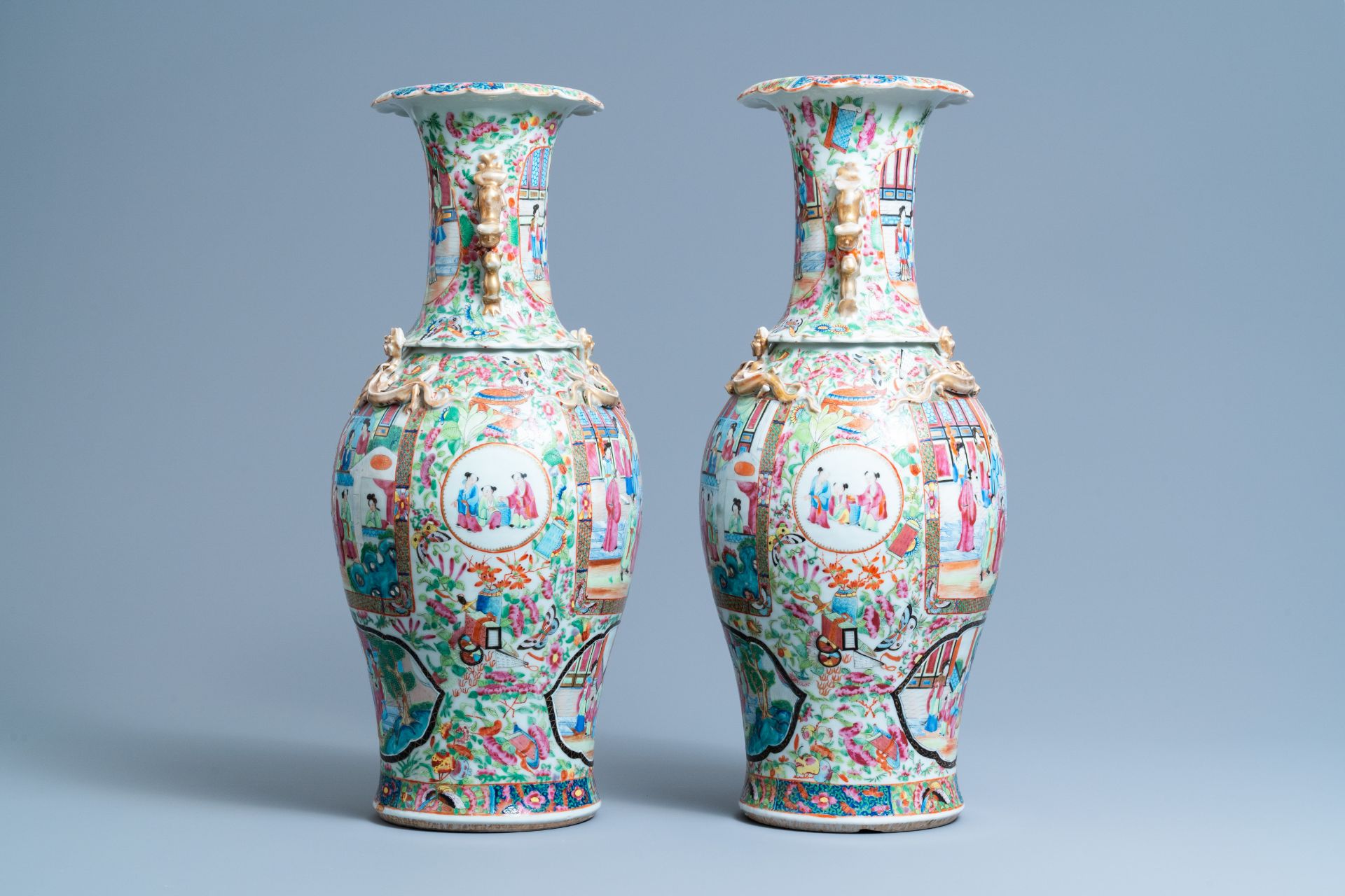 A pair of Chinese Canton famille rose vases, 19th C. - Image 2 of 6