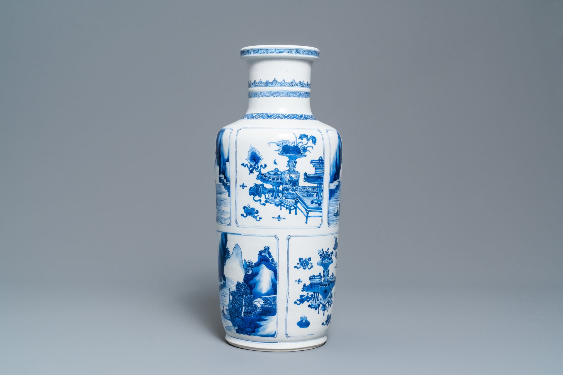 A Chinese blue and white 'antiquities and landscapes' rouleau vase, Kangxi - Image 7 of 35