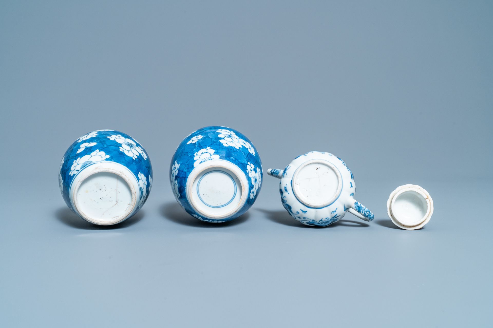 A pair of Chinese blue & white 'prunus' jars & a 'butterfly' teapot & cover, Kangxi - Image 8 of 8