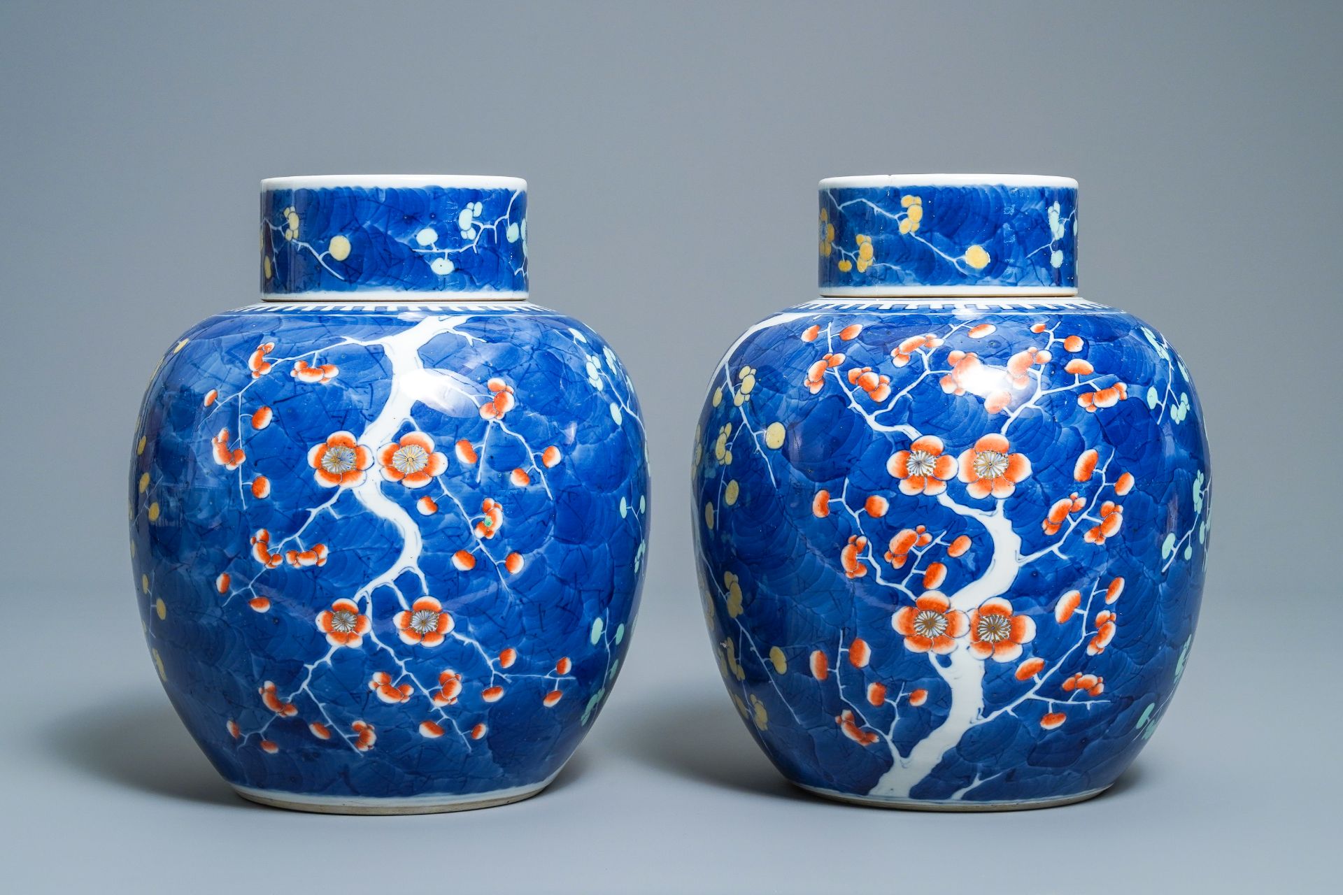 A pair of Chinese polychrome 'prunus on cracked ice' jars and covers, 19th C. - Image 4 of 9