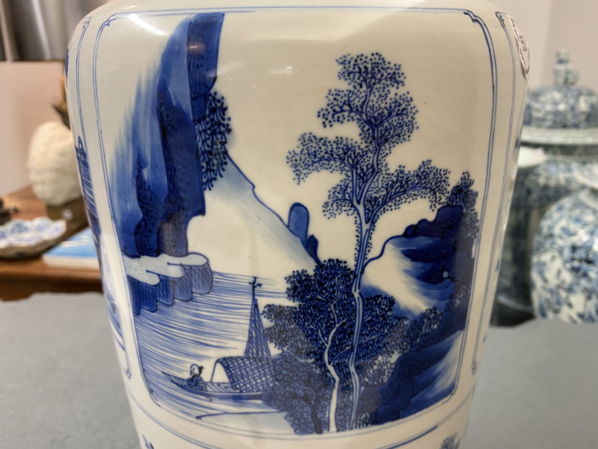A Chinese blue and white 'antiquities and landscapes' rouleau vase, Kangxi - Image 26 of 35