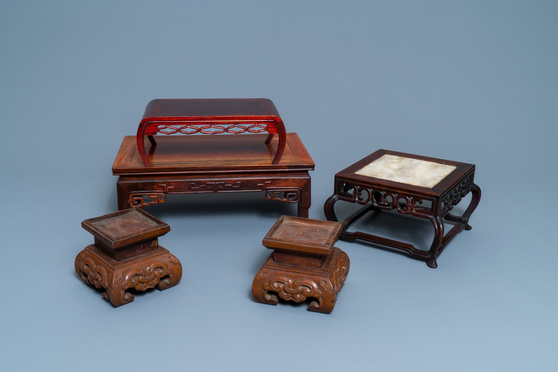 Five Chinese wooden stands, 19/20th C.